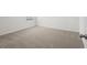 Neutral bedroom with plush carpeting and a window that allows natural light at 3655 Moscato Dr, Brooksville, FL 34602