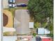 Bird's-eye view of the property and backyard with shed and carport at 3850 Carioca Rd, Holiday, FL 34691