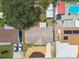 Aerial view shows the property layout with proximity to a neighborhood pool at 3850 Carioca Rd, Holiday, FL 34691