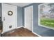 Entryway features wood floors, neutral paint, and view to outside, creating a bright and welcoming atmosphere at 4044 56Th N Ave, St Petersburg, FL 33714
