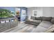 Cozy living room with modern furnishings, a large gray sectional, and an open view to the kitchen at 4044 56Th N Ave, St Petersburg, FL 33714