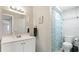 A bathroom featuring a single sink vanity and a shower and bathtub combination at 4207 Northwind Ln, Tampa, FL 33624