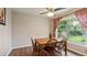 Dining room with a window, table, and hardwood floors at 4207 Northwind Ln, Tampa, FL 33624