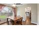 Dining room with a table, bench, and hardwood floors at 4207 Northwind Ln, Tampa, FL 33624