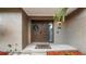 Inviting front entrance features a wreath, a welcome mat, and brick accents at 4207 Northwind Ln, Tampa, FL 33624
