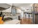 Kitchen with stainless steel appliances, backsplash, and breakfast bar at 4207 Northwind Ln, Tampa, FL 33624