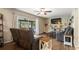 Comfortable living room with recliners, built in shelving, and a sliding glass door at 4207 Northwind Ln, Tampa, FL 33624