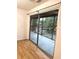 Open-concept design with sliding glass doors leads to a balcony view at 4207 Winding Moss Trl # 201, Tampa, FL 33613