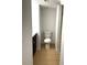 Bathroom with a white toilet and neutral-colored tile flooring at 4207 Winding Moss Trl # 201, Tampa, FL 33613