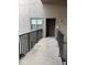 Unit front door with exterior ramp and alarm system access for easy entry at 4207 Winding Moss Trl # 201, Tampa, FL 33613