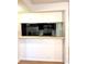 Modern kitchen featuring stainless steel appliances and a breakfast bar for casual dining at 4207 Winding Moss Trl # 201, Tampa, FL 33613