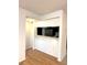 Open floor plan featuring eat-in bar overlooking stainless steel appliances at 4207 Winding Moss Trl # 201, Tampa, FL 33613
