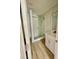 Beautiful bathroom with marble shower and wooden floor at 4415 Tuna Dr, Tampa, FL 33617