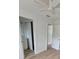 Bright bedroom with white walls, ceiling fan, and updated fixtures at 4415 Tuna Dr, Tampa, FL 33617