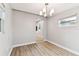 Open dining room featuring hardwood floors and bright lighting at 508 38Th N Ave, St Petersburg, FL 33704