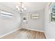 Dining room with chandelier and new hardwood flooring at 508 38Th N Ave, St Petersburg, FL 33704