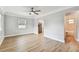 Bright living room featuring wood floors and an archway to the kitchen at 508 38Th N Ave, St Petersburg, FL 33704