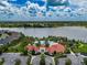 Luxury clubhouse and community pool overlooking serene lake offer upscale amenities at 5329 Senza Trl, Palmetto, FL 34221