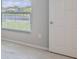 A window offers exterior view from the carpeted bedroom at 5329 Senza Trl, Palmetto, FL 34221