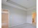 A neutral-toned room features adjacent rooms through open doorways at 5329 Senza Trl, Palmetto, FL 34221