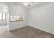 Dining area with a pass-through to the kitchen for easy serving at 5785 Gardens Dr, Sarasota, FL 34243