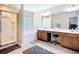 Bright bathroom with a soaking tub, a separate shower, and double vanities at 5830 100Th E Ave, Parrish, FL 34219
