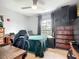 This bedroom has a window that allows natural light to flow in at 5830 100Th E Ave, Parrish, FL 34219
