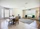 Dining area with tile flooring, dining table and seating, and natural light at 5830 100Th E Ave, Parrish, FL 34219