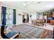 Open concept living room seamlessly connects to the dining area and kitchen at 5830 100Th E Ave, Parrish, FL 34219