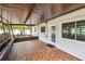 The covered and screened patio has a tile floor and lots of room to relax at 5934 51St N Ave, Kenneth City, FL 33709