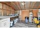 An interior shot of a shed that provides ample storage space with shelves and room for tools at 5934 51St N Ave, Kenneth City, FL 33709