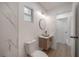 Modern bathroom featuring wood vanity with vessel sink and glass-enclosed shower at 6108 Oak Ridge Ave, New Port Richey, FL 34653