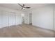 Bedroom with wood-look flooring and an array of large closets for plenty of storage at 6108 Oak Ridge Ave, New Port Richey, FL 34653