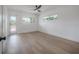 Large room with lots of light and windows with access to a spacious outdoor deck at 6108 Oak Ridge Ave, New Port Richey, FL 34653