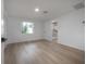 Bedroom boasts light wood-look flooring and recessed lighting at 6108 Oak Ridge Ave, New Port Richey, FL 34653