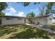 Charming home featuring fresh exterior paint and an inviting outdoor deck at 6108 Oak Ridge Ave, New Port Richey, FL 34653