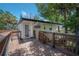 Exterior view of the home, highlighting the large wooden deck and access door at 6108 Oak Ridge Ave, New Port Richey, FL 34653