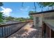 Spacious wood deck with a railing, overlooking the outdoor scenery and waterfront at 6108 Oak Ridge Ave, New Port Richey, FL 34653