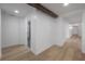 Hallway features recessed lighting and light wood-look flooring at 6108 Oak Ridge Ave, New Port Richey, FL 34653