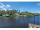 Waterfront property with a private dock and lush greenery, providing direct access to the serene canal at 6108 Oak Ridge Ave, New Port Richey, FL 34653