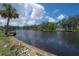 Beautiful waterfront view showcasing the calm canal, docks, and surrounding foliage, perfect for relaxation at 6108 Oak Ridge Ave, New Port Richey, FL 34653