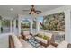 Inviting covered patio with comfortable seating and a tranquil view of the surrounding foliage at 6220 Bayshore Blvd, Tampa, FL 33611