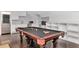 Spacious game room with a pool table and kitchenette perfect for entertaining at 6220 Bayshore Blvd, Tampa, FL 33611