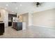Spacious kitchen featuring stainless appliances, a kitchen island, and a connected dining area at 6909 Holly Heath Dr, Riverview, FL 33578