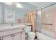 Bathroom with a single vanity, mirror, toilet, and shower/tub combo at 7000 Lafayette N, Pinellas Park, FL 33781