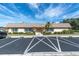 Community clubhouse featuring well maintained landscaping and convenient parking at 7000 Lafayette N, Pinellas Park, FL 33781