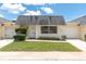 Charming single-story home with well-maintained lawn and attached garage in a quiet neighborhood at 7000 Lafayette N, Pinellas Park, FL 33781