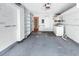 Spacious garage with built-in shelving, laundry hookups and ample storage space at 7000 Lafayette N, Pinellas Park, FL 33781