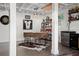 Finished basement with a bar area, mini fridge, and industrial design at 702 W Kentucky Ave, Tampa, FL 33603