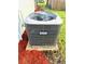 Outside AC unit with Tempstar brand, surrounded by mulch at 7314 Ivanhoe Dr, Port Richey, FL 34668